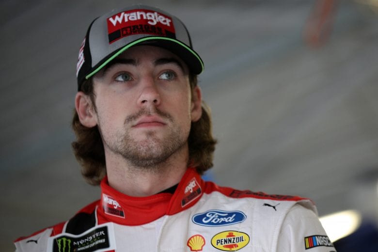 KANSAS CITY, KS - OCTOBER 19:  Ryan Blaney, driver of the #12 Menards/Wrangler Riggs Workwear Ford, stands in the garage area during practice for the Monster Energy NASCAR Cup Series Hollywood Casino 400 at Kansas Speedway on October 19, 2018 in Kansas City, Kansas.  (Photo by Chris Graythen/Getty Images) | Getty Images
