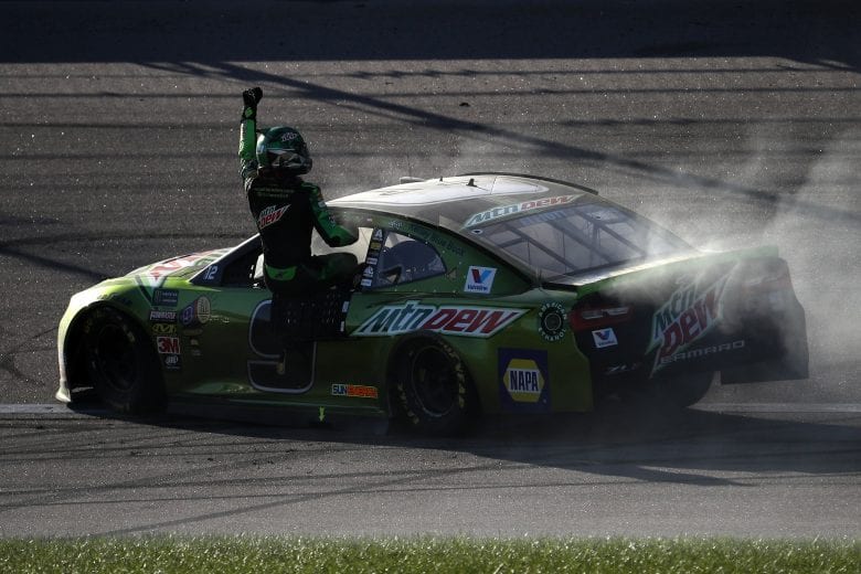 KANSAS CITY, KS - OCTOBER 21:  Chase Elliott, driver of the #9 Mountain Dew Chevrolet, celebrates after winning the Monster Energy NASCAR Cup Series Hollywood Casino 400 at Kansas Speedway on October 21, 2018 in Kansas City, Kansas.  (Photo by Chris Graythen/Getty Images) | Getty Images