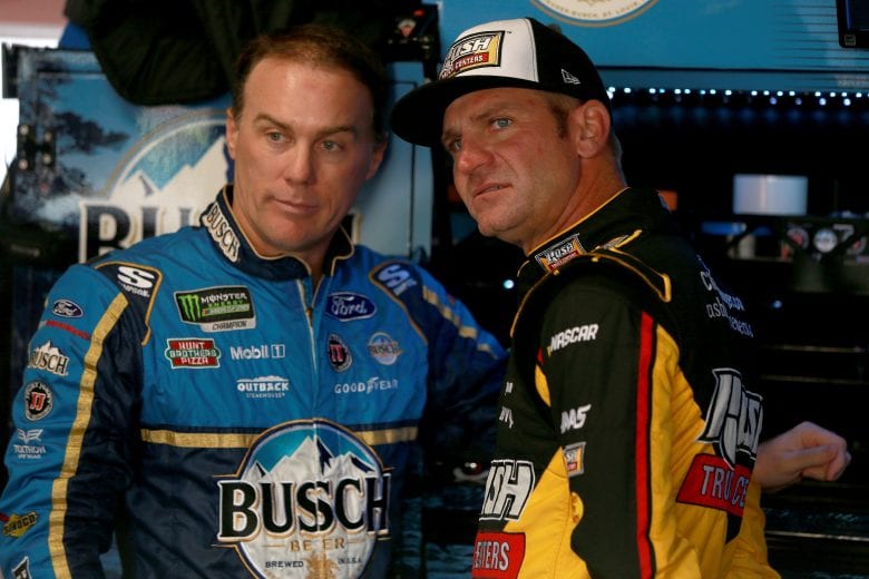 MARTINSVILLE, VA - OCTOBER 27:  Kevin Harvick, driver of the #4 Busch Beer Ford, speaks with Clint Bowyer, driver of the #14 Rush Truck Centers Ford, in the garage area during practice for the Monster Energy NASCAR Cup Series First Data 500 at Martinsville Speedway on October 27, 2018 in Martinsville, Virginia.  (Photo by Sean Gardner/Getty Images) | Getty Images