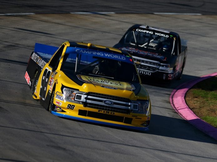 MARTINSVILLE, VA - OCTOBER 27: Grant Enfinger, driver of the #98 Protect the Harvest Ford, qualifies for the NASCAR Camping World Truck Series Texas Roadhouse 200 presented by Alpha Energy Solutions at Martinsville Speedway on October 27, 2018 in Martinsville, Virginia. (Photo by Sarah Crabill/Getty Images) | Getty Images