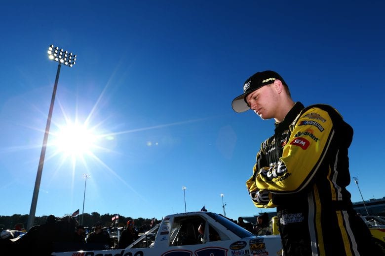 MARTINSVILLE, VA - OCTOBER 27: Justin Haley, driver of the #24 Fraternal Order of Eagles Chevrolet, stands on the grid during qualifying for the NASCAR Camping World Truck Series Texas Roadhouse 200 presented by Alpha Energy Solutions at Martinsville Speedway on October 27, 2018 in Martinsville, Virginia. (Photo by Sean Gardner/Getty Images) | Getty Images