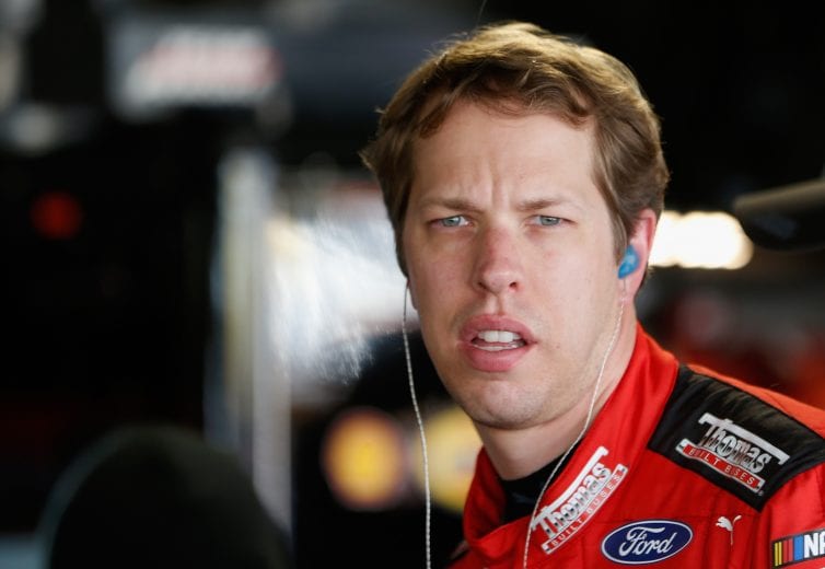 MARTINSVILLE, VA - OCTOBER 27: Brad Keselowski, driver of the #2 Thomas Built Buses Ford, stands in the garage area during practice for the Monster Energy NASCAR Cup Series First Data 500 at Martinsville Speedway on October 27, 2018 in Martinsville, Virginia. (Photo by Brian Lawdermilk/Getty Images) | Getty Images