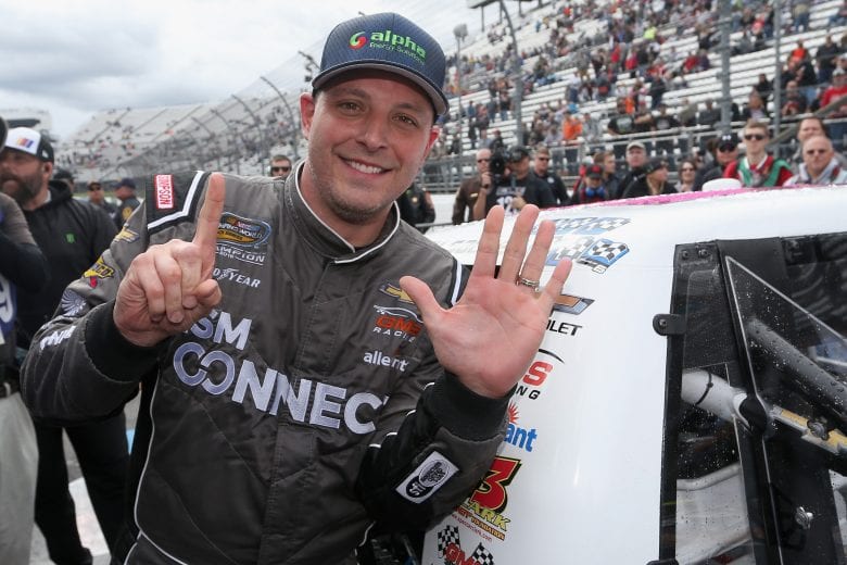 MARTINSVILLE, VA - OCTOBER 27: Johnny Sauter, driver of the #21 ISM Connect Chevrolet, poses with the winner's decal on his truck in Victory Lane after winning the NASCAR Camping World Truck Series Texas Roadhouse 200 presented by Alpha Energy Solutions at Martinsville Speedway on October 27, 2018 in Martinsville, Virginia. (Photo by Brian Lawdermilk/Getty Images) | Getty Images