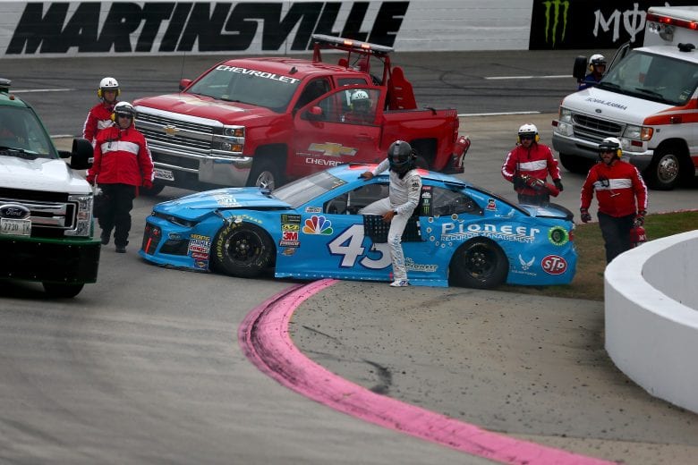 MARTINSVILLE, VA - OCTOBER 27: Bubba Wallace, driver of the #43 Pioneer Records Management Chevrolet, climbs from his car following an on-track incident during qualifying for the Monster Energy NASCAR Cup Series First Data 500 at Martinsville Speedway on October 27, 2018 in Martinsville, Virginia. (Photo by Sarah Crabill/Getty Images) | Getty Images