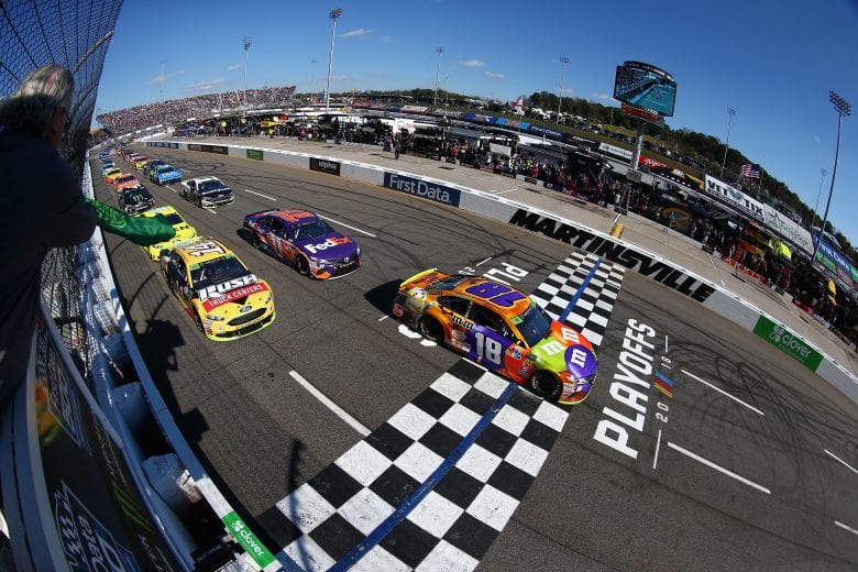 MARTINSVILLE, VA - OCTOBER 28: Kyle Busch, driver of the #18 M&M's Halloween Toyota, leads the field to the green flag to start the Monster Energy NASCAR Cup Series First Data 500 at Martinsville Speedway on October 28, 2018 in Martinsville, Virginia. (Photo by Sarah Crabill/Getty Images) | Getty Images