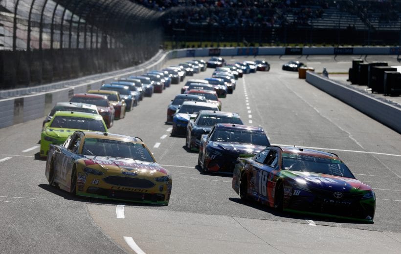 MARTINSVILLE, VA - OCTOBER 28: Kyle Busch, driver of the #18 M&M's Halloween Toyota, and Clint Bowyer, driver of the #14 Rush Truck Centers Ford, lead the field under caution prior to the start of the Monster Energy NASCAR Cup Series First Data 500 at Martinsville Speedway on October 28, 2018 in Martinsville, Virginia. (Photo by Brian Lawdermilk/Getty Images) | Getty Images