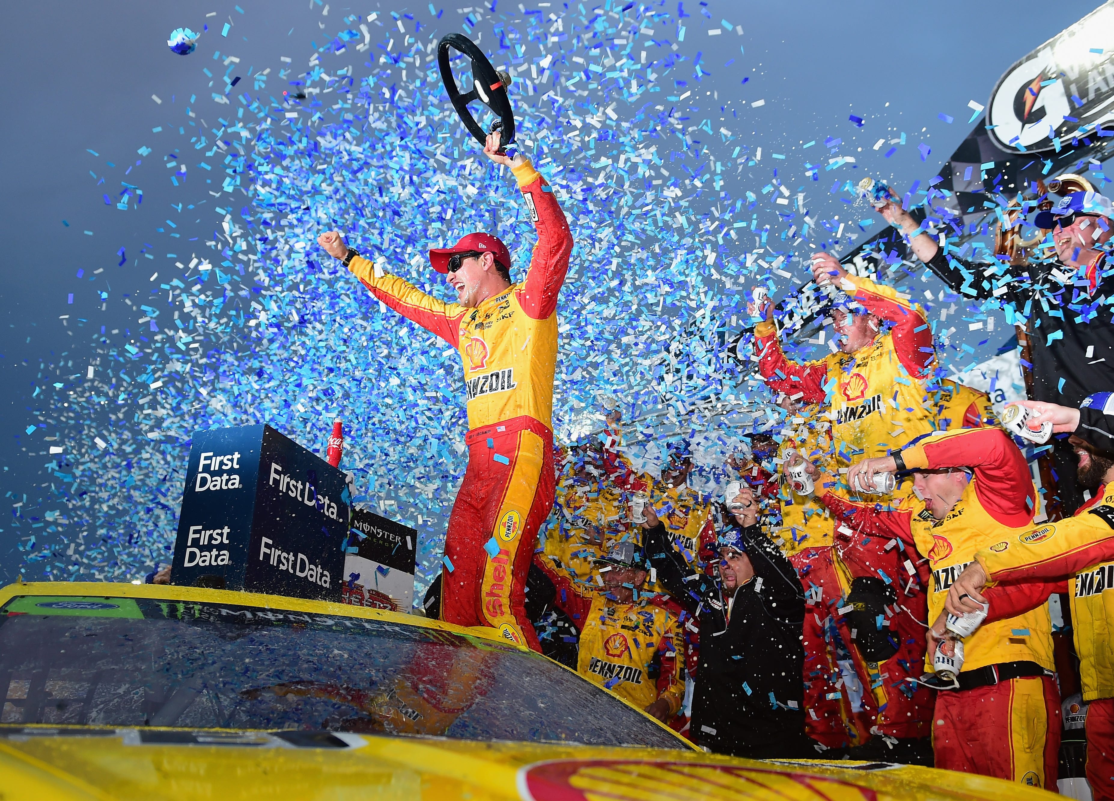 MARTINSVILLE, VA - OCTOBER 28:  Joey Logano, driver of the #22 Shell Pennzoil Ford, celebrates in Victory Lane after winning the Monster Energy NASCAR Cup Series First Data 500 at Martinsville Speedway on October 28, 2018 in Martinsville, Virginia.  (Photo by Jared C. Tilton/Getty Images) | Getty Images