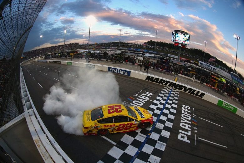 MARTINSVILLE, VA - OCTOBER 28: Joey Logano, driver of the #22 Shell Pennzoil Ford, celebrates with a burnout after winning the Monster Energy NASCAR Cup Series First Data 500 at Martinsville Speedway on October 28, 2018 in Martinsville, Virginia. (Photo by Sarah Crabill/Getty Images) | Getty Images