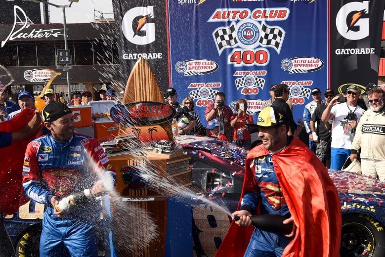 FONTANA, CA - MARCH 20:  Jimmie Johnson, driver of the #48 Lowe's / Superman Chevrolet, celebrates in victory lane with crew chief Chad Knaus after winning the NASCAR Sprint Cup Series Auto Club 400 at Auto Club Speedway on March 20, 2016 in Fontana, California.  (Photo by Jonathan Moore/Getty Images) | Getty Images