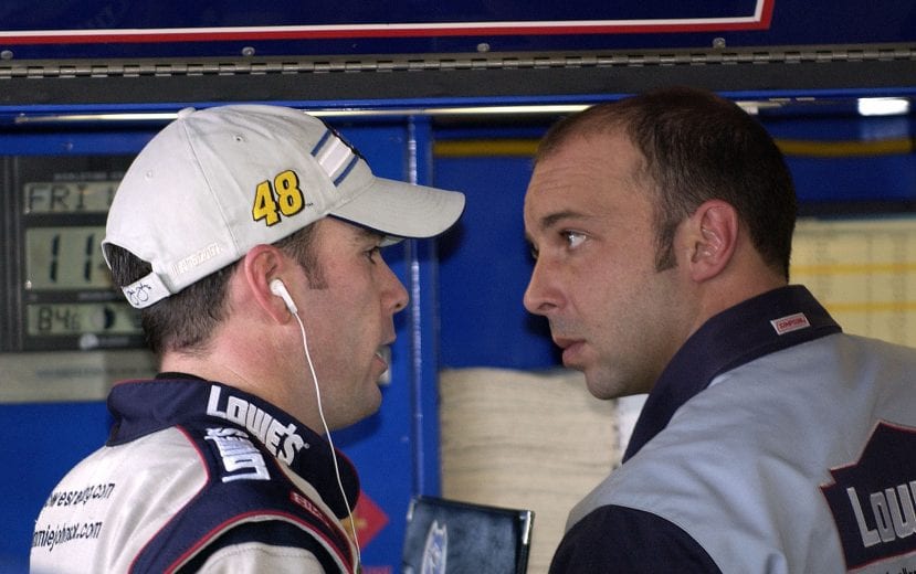 HOMESTEAD, FL - NOVEMBER 19:  Jimmie Johnson, driver of the # 48 Lowes Chevrolet and his crew chief Chad Knaus, during practice for the NASCAR Nextel Cup Series Ford 400 on November 19, 2004 at the Homestead Miami Speedway in Homestead, Florida.  (Photo by Rusty Jarrett/Getty Images) | Getty Images