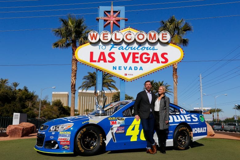 LAS VEGAS, NV - NOVEMBER 30:  NASCAR Sprint Cup Series champion crew chief Chad Knaus and Brooke Werner pose in front of the Welcome to Fabulous Las Vegas sign during NASCAR Champion's Week on November 30, 2016 in Las Vegas, Nevada.  (Photo by Jonathan Ferrey/NASCAR via Getty Images)