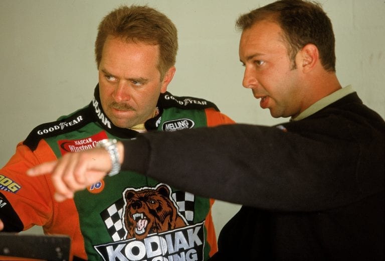 DAYTONA BEACH, FL - FEBRUARY 12:  Stacy Compton #92 drives a Dodge Untrepid for Melling Racing talks with his crew chief Chad Knaus in the garage during the Daytona 500 Speedweeks on February 12, 2001 at the Daytona International Speedway in Daytona Beach, Florida.  (Photo by Robert Laberge/Getty Images)