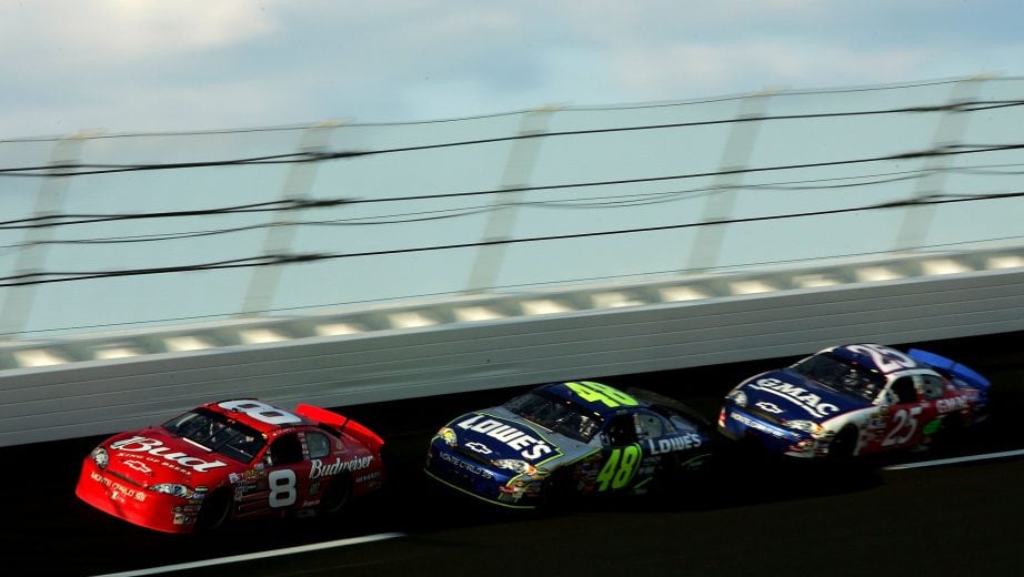TALLADEGA, AL - OCTOBER 08: Dale Earnahrdt Jr., driver of the #8 Budweiser Chevrolet, leads Jimmie Johnson, driver of the #48 Lowe's Chevrolet, and Brian Vickers, driver of the #25 GMAC Chevolet, during the NASCAR Nextel Cup Series UAW-Ford 500 on October 8, 2006 at Talladega Superspeedway in Talladega, Alabama. (Photo by Matthew Stockman/Getty Images) | Getty Images