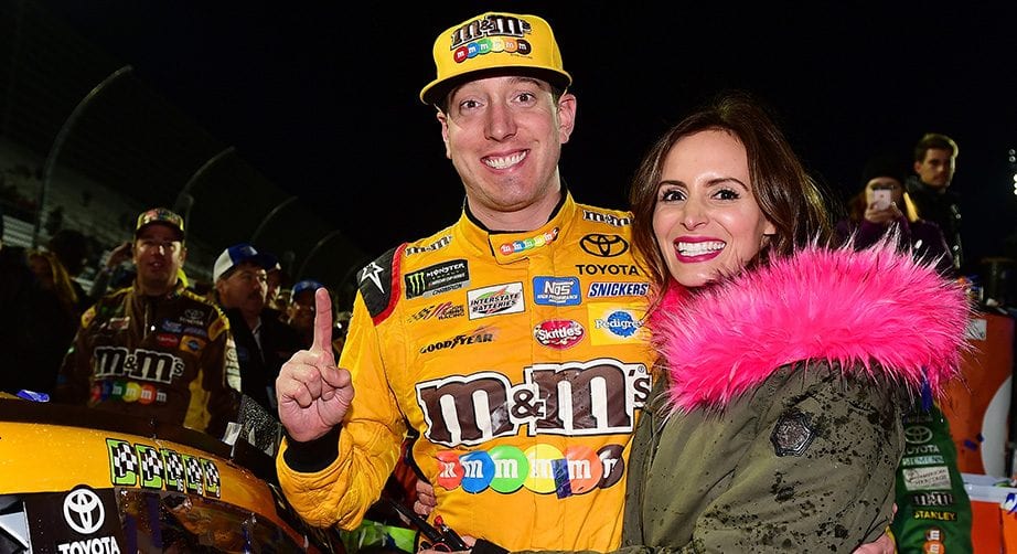 Kyle Busch celebrates with his wife in Victory Lane at Martinsville in 2017.