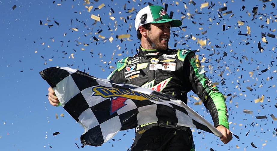 Chase Elliott celebrates his Kansas win