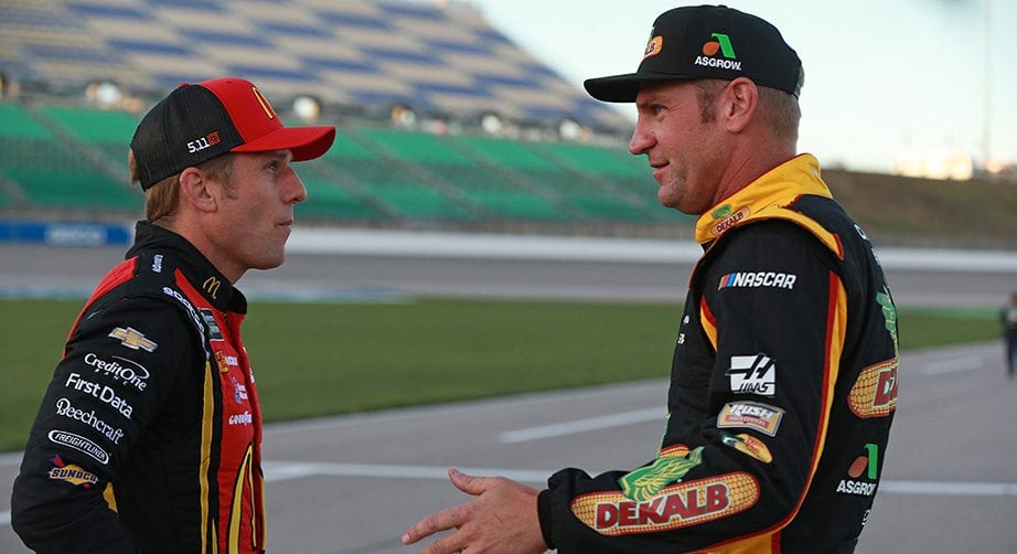 KANSAS CITY, KS - OCTOBER 19: Jamie McMurray, driver of the #1 McDonald's Trick. Treat. Win! Chevrolet, talks with Clint Bowyer, driver of the #14 Dekalb Ford, during qualifying for the Monster Energy NASCAR Cup Series Hollywood Casino 400 at Kansas Speedway on October 19, 2018 in Kansas City, Kansas. (Photo by Matt Sullivan/Getty Images) | Getty Images