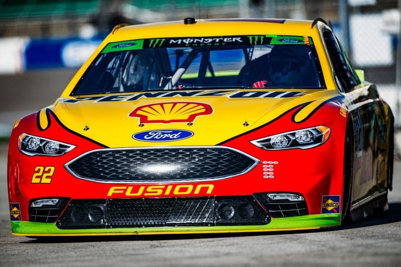 Joey Logano rolls out for practice at Kansas.