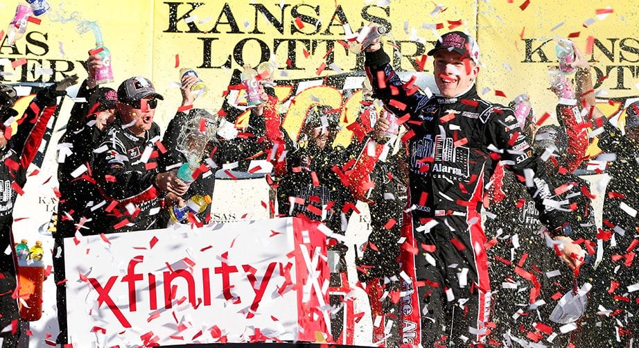 John Hunter Nemechek celebrates in Victory Lane at Kansas.