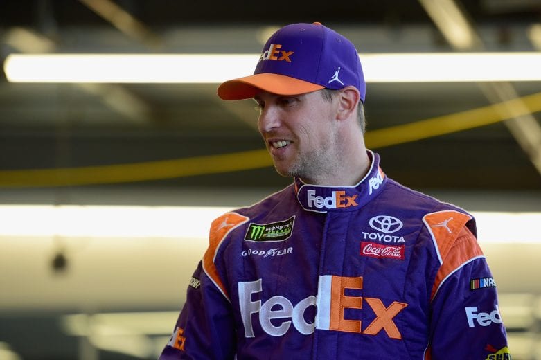 PHOENIX, AZ - NOVEMBER 09: Denny Hamlin, driver of the #11 FedEx Ground Toyota, stands in the garage area during practice for the Monster Energy NASCAR Cup Series Can-Am 500 at ISM Raceway on November 9, 2018 in Phoenix, Arizona. (Photo by Jared C. Tilton/Getty Images) | Getty Images