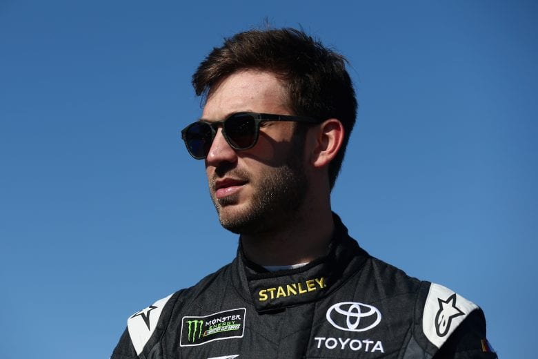PHOENIX, AZ - NOVEMBER 09: Daniel Suarez, driver of the #19 STANLEY Toyota, walks through the garage area during practice for the Monster Energy NASCAR Cup Series Can-Am 500 at ISM Raceway on November 9, 2018 in Phoenix, Arizona. (Photo by Sarah Crabill/Getty Images) | Getty Images