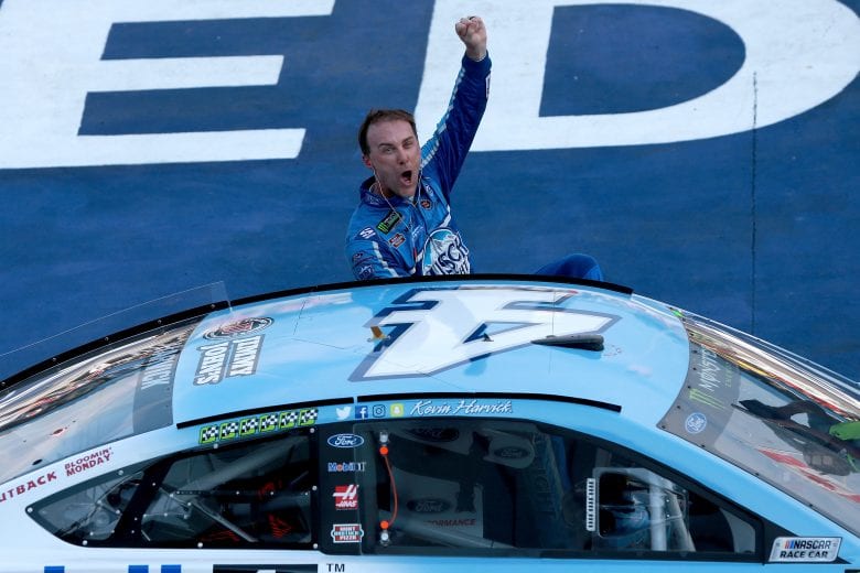 BROOKLYN, MI - AUGUST 12: Kevin Harvick, driver of the #4 Busch Light/Mobil 1 Ford, celebrates after winning the Monster Energy NASCAR Cup Series Consmers Energy 400 at Michigan International Speedway on August 12, 2018 in Brooklyn, Michigan. (Photo by Sean Gardner/Getty Images) | Getty Images