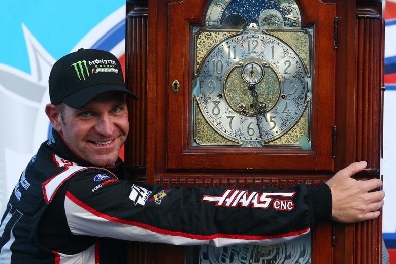 MARTINSVILLE, VA - MARCH 26:  Clint Bowyer, driver of the #14 Haas Automation Demo Day Ford, celebrates with the trophy in Victory Lane after winning the weather delayed Monster Energy NASCAR Cup Series STP 500 at Martinsville Speedway on March 26, 2018 in Martinsville, Virginia.  (Photo by Sarah Crabill/Getty Images) | Getty Images