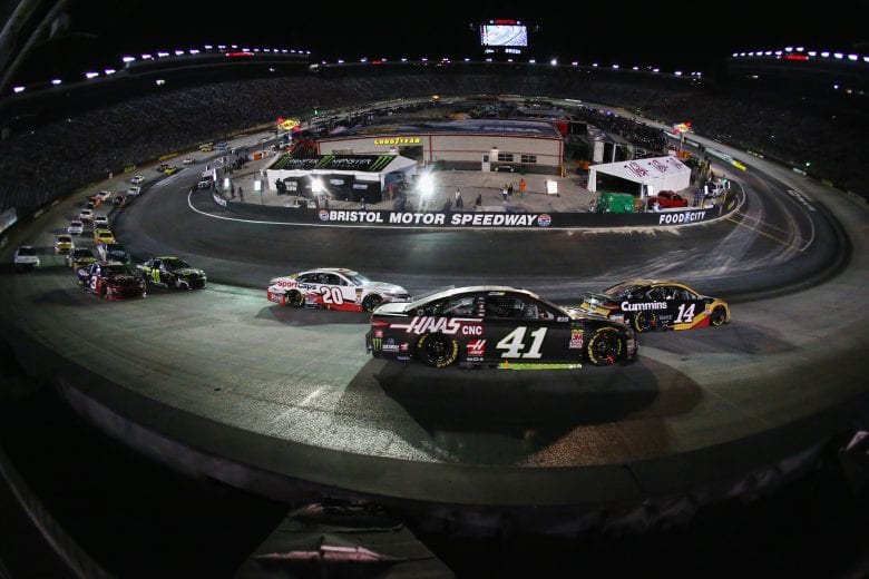 BRISTOL, TN - AUGUST 18:  Clint Bowyer, driver of the #14 Rush Truck Centers/Cummins Ford, leads Kurt Busch, driver of the #41 Monster Energy/Haas Automation Ford, during the Monster Energy NASCAR Cup Series Bass Pro Shops NRA Night Race at Bristol Motor Speedway on August 18, 2018 in Bristol, Tennessee.  (Photo by Sarah Crabill/Getty Images) | Getty Images