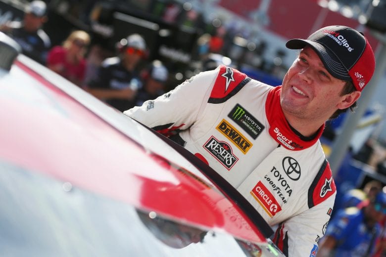 BRISTOL, TN - AUGUST 17: Erik Jones, driver of the #20 Sport Clips Toyota, stands by his car during qualifying for the Monster Energy NASCAR Cup Series Bass Pro Shops NRA Night Race at Bristol Motor Speedway on August 17, 2018 in Bristol, Tennessee. (Photo by Sarah Crabill/Getty Images) | Getty Images