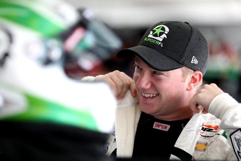 CHARLOTTE, NC - SEPTEMBER 28:  Tyler Reddick, driver of the #9 BurgerFi Chevrolet, stands in the garage during practice for the NASCAR XFINITY Series Drive for the Cure 200 at Charlotte Motor Speedway on September 28, 2018 in Charlotte, North Carolina.  (Photo by Sean Gardner/Getty Images) | Getty Images