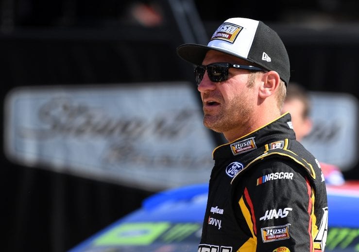 FORT WORTH, TX - NOVEMBER 02: Clint Bowyer, driver of the #14 Rush Truck Centers/Mobil Delvac 1 Ford, walks through the garage area during practice for the Monster Energy NASCAR Cup Series AAA Texas 500 at Texas Motor Speedway on November 2, 2018 in Fort Worth, Texas. (Photo by Josh Hedges/Getty Images) | Getty Images