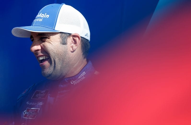 FORT WORTH, TX - NOVEMBER 02: Elliott Sadler, driver of the #1 OneMain Financial Chevrolet, stands in the garage during practice for the NASCAR Xfinity Series O'Reilly Auto Parts 300 at Texas Motor Speedway on November 2, 2018 in Fort Worth, Texas. (Photo by Brian Lawdermilk/Getty Images) | Getty Images