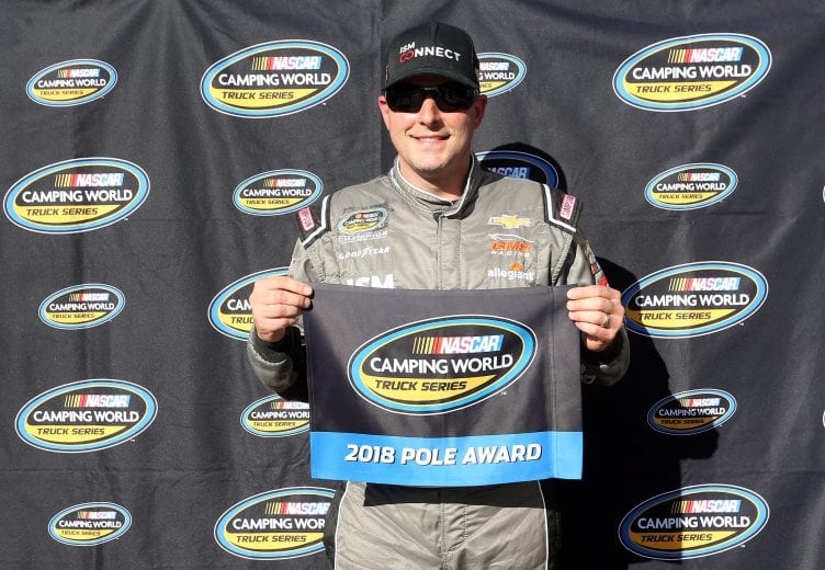 FORT WORTH, TX - NOVEMBER 02: Johnny Sauter, driver of the #21 ISM Connect Chevrolet, poses with the pole award after qualifying on the pole for the NASCAR Camping World Truck Series JAG Metals 350 at Texas Motor Speedway on November 2, 2018 in Fort Worth, Texas. (Photo by Brian Lawdermilk/Getty Images) | Getty Images