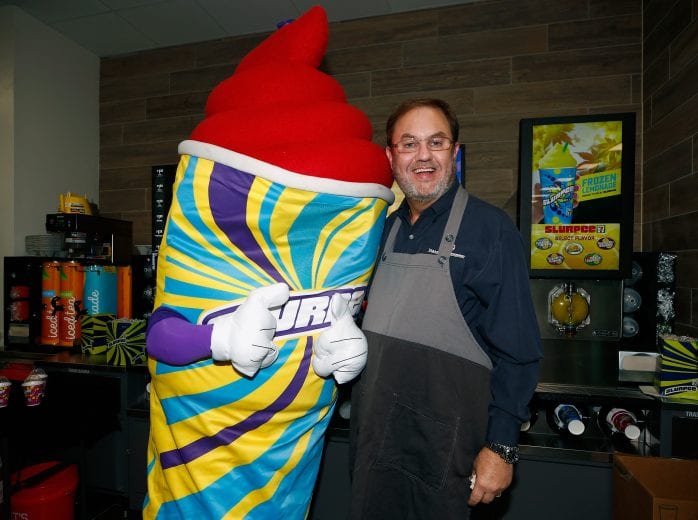 FORT WORTH, TX - NOVEMBER 02: Texas Motor Speedway President Eddie Gossage serves free Slurpees to fans following the