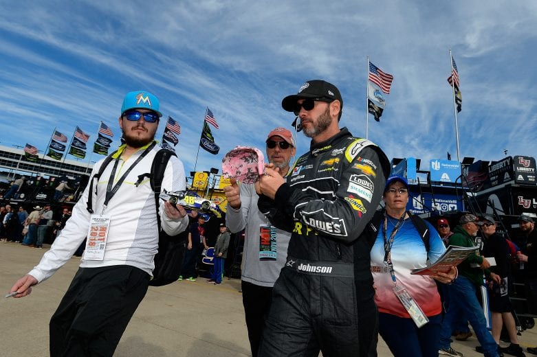 FORT WORTH, TX - NOVEMBER 03: Jimmie Johnson, driver of the #48 Lowe's for Pros Chevrolet, signs autographs in the garage area during practice for the Monster Energy NASCAR Cup Series AAA Texas 500 at Texas Motor Speedway on November 3, 2018 in Fort Worth, Texas. (Photo by Robert Laberge/Getty Images) | Getty Images