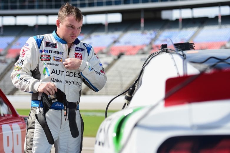 Cole Custer, driver of the #00 Autodesk Ford, stands on the grid during qualifying for the NASCAR Xfinity Series O'Reilly Auto Parts 300 at Texas Motor Speedway