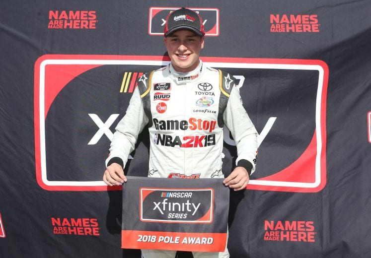 FORT WORTH, TX - NOVEMBER 03: Christopher Bell, driver of the #20 GameStop NBA 2K19 Toyota, poses with the pole award after qualifying on the pole position for the NASCAR Xfinity Series O'Reilly Auto Parts 300 at Texas Motor Speedway on November 3, 2018 in Fort Worth, Texas. (Photo by Brian Lawdermilk/Getty Images) | Getty Images