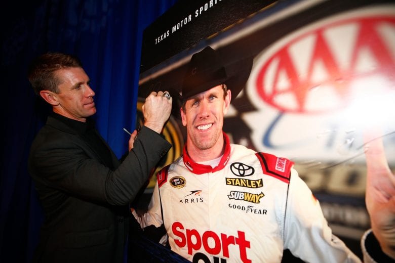 FORT WORTH, TX - NOVEMBER 03: Former NASCAR driver Carl Edwards signs a poster during the Texas Motorsports Hall of Fame ceremony at Texas Motor Speedway on November 3, 2018 in Fort Worth, Texas. (Photo by Matt Sullivan/Getty Images) | Getty Images