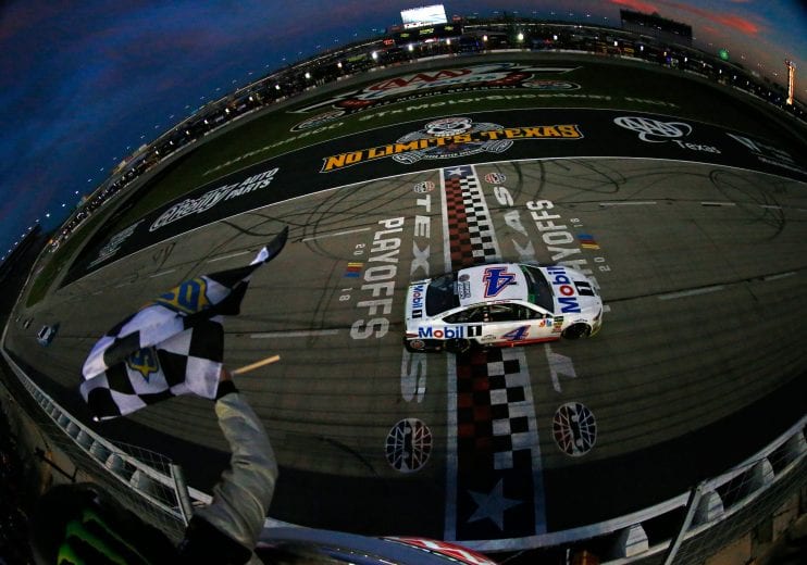 FORT WORTH, TX - NOVEMBER 04: Kevin Harvick, driver of the #4 Mobil 1 Ford, takes the checkered flag to win the Monster Energy NASCAR Cup Series AAA Texas 500 at Texas Motor Speedway on November 4, 2018 in Fort Worth, Texas. (Photo by Matt Sullivan/Getty Images) | Getty Images
