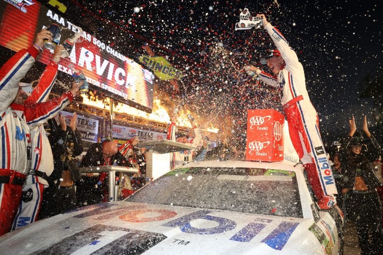 FORT WORTH, TX - NOVEMBER 04: Kevin Harvick, driver of the #4 Mobil 1 Ford, celebrates in victory lane after winning the Monster Energy NASCAR Cup Series AAA Texas 500 at Texas Motor Speedway on November 4, 2018 in Fort Worth, Texas. (Photo by Chris Graythen/Getty Images) | Getty Images