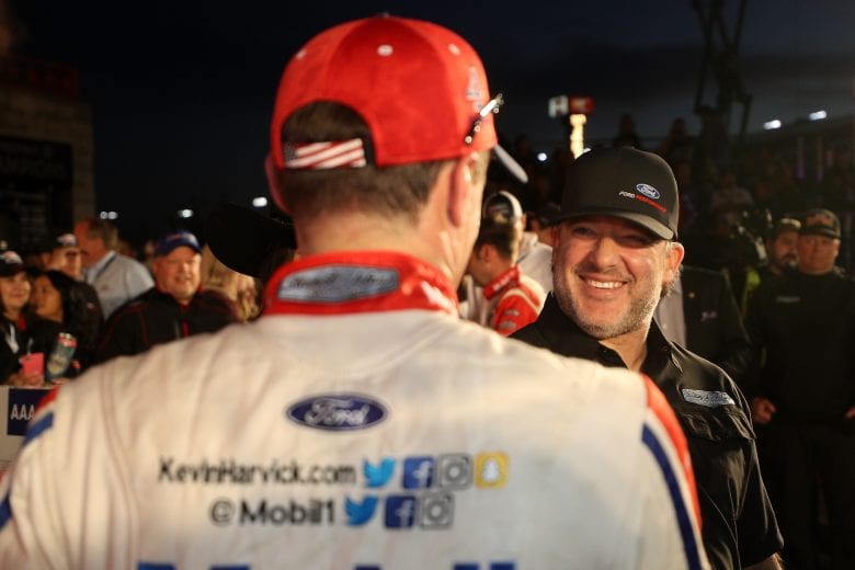 FORT WORTH, TX - NOVEMBER 04: Kevin Harvick, driver of the #4 Mobil 1 Ford, and team owner Tony Stewart celebrate in Victory Lane after winning the Monster Energy NASCAR Cup Series AAA Texas 500 at Texas Motor Speedway on November 4, 2018 in Fort Worth, Texas. (Photo by Chris Graythen/Getty Images) | Getty Images