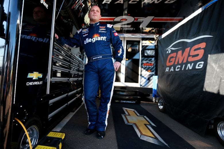 PHOENIX, AZ - NOVEMBER 09:  Johnny Sauter, driver of the #21 ISM Connect Chevrolet, stands in the garage area during practice for the NASCAR Camping World Truck Series Lucas Oil 150 at ISM Raceway on November 9, 2018 in Phoenix, Arizona.  (Photo by Sean Gardner/Getty Images) | Getty Images