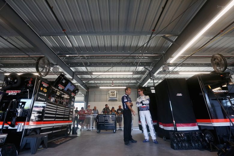 PHOENIX, AZ - NOVEMBER 09:  Brad Keselowski, driver of the #2 Miller Lite Ford, and his crew chief Paul Wolfe stand in the garage area during practice for the Monster Energy NASCAR Cup Series Can-Am 500 at ISM Raceway on November 9, 2018 in Phoenix, Arizona.  (Photo by Sarah Crabill/Getty Images) | Getty Images