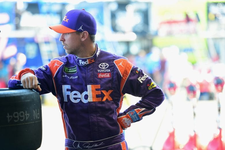PHOENIX, AZ - NOVEMBER 09:  Denny Hamlin, driver of the #11 FedEx Ground Toyota, stands in the garage area during practice for the Monster Energy NASCAR Cup Series Can-Am 500 at ISM Raceway on November 9, 2018 in Phoenix, Arizona.  (Photo by Jared C. Tilton/Getty Images) | Getty Images