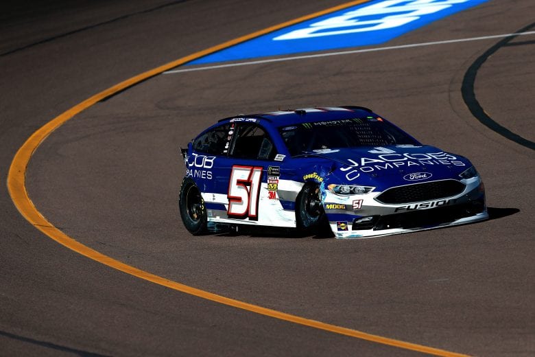 PHOENIX, AZ - NOVEMBER 09:  Cody Ware, driver of the #51 JacobCo./BanyanCayGolfClub&Resort Ford, is involved in an on-track incident during practice for the Monster Energy NASCAR Cup Series Can-Am 500 at ISM Raceway on November 9, 2018 in Phoenix, Arizona.  (Photo by Sean Gardner/Getty Images) | Getty Images