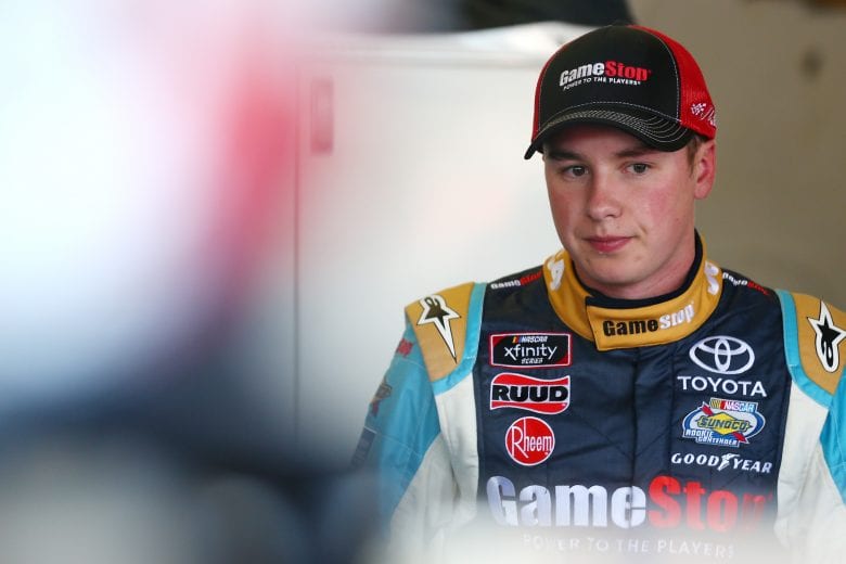 PHOENIX, AZ - NOVEMBER 09:  Christopher Bell, driver of the #20 GameStop Just Cause 4 Toyota, stands in the garage area during practice for the NASCAR Xfinity Series Whelen Trusted To Perform 200 at ISM Raceway on November 9, 2018 in Phoenix, Arizona.  (Photo by Sarah Crabill/Getty Images) | Getty Images