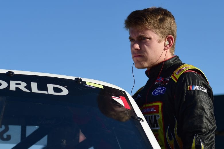 PHOENIX, AZ - NOVEMBER 09:  Myatt Snider, driver of the #13 Tenda Ford, climbs into his truck during qualifying for the NASCAR Camping World Truck Series Lucas Oil 150 at ISM Raceway on November 9, 2018 in Phoenix, Arizona.  (Photo by Jared C. Tilton/Getty Images) | Getty Images