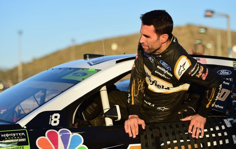 PHOENIX, AZ - NOVEMBER 09:  Aric Almirola, driver of the #10 Smithfield Ford, climbs into his car during qualifying for the Monster Energy NASCAR Cup Series Can-Am 500 at ISM Raceway on November 9, 2018 in Phoenix, Arizona.  (Photo by Jared C. Tilton/Getty Images) | Getty Images