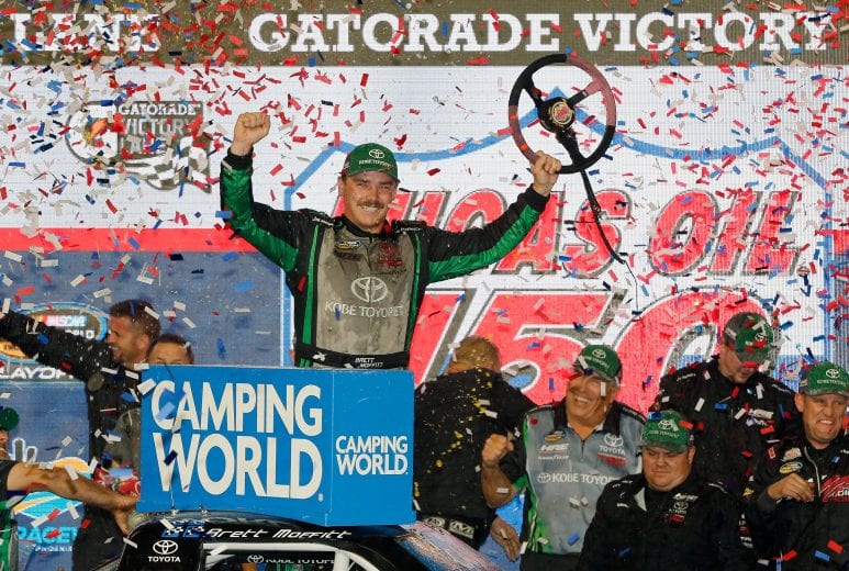 PHOENIX, AZ - NOVEMBER 09:  Brett Moffitt, driver of the #16 KOBE Toyopet Toyota, celebrates in Victory Lane after winning the NASCAR Camping World Truck Series Lucas Oil 150 at ISM Raceway on November 9, 2018 in Phoenix, Arizona.  (Photo by Jonathan Ferrey/Getty Images) | Getty Images