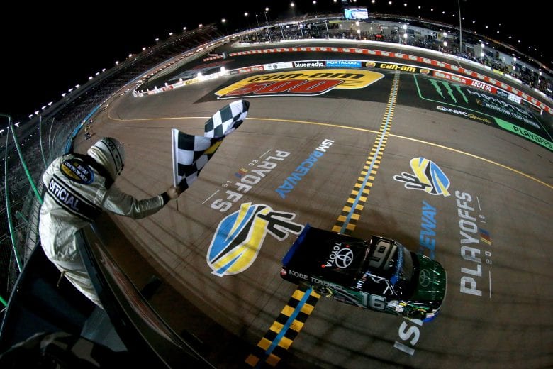PHOENIX, AZ - NOVEMBER 09:  Brett Moffitt, driver of the #16 KOBE Toyopet Toyota, crosses the finish line to win the NASCAR Camping World Truck Series Lucas Oil 150 at ISM Raceway on November 9, 2018 in Phoenix, Arizona.  (Photo by Sean Gardner/Getty Images) | Getty Images
