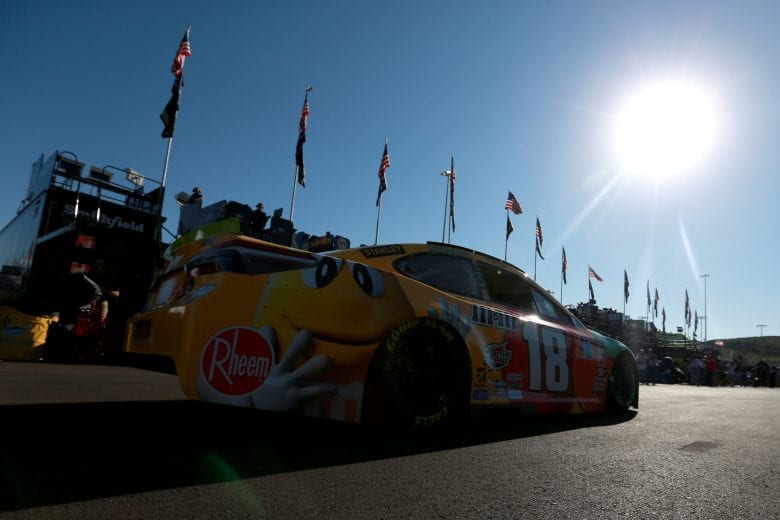 PHOENIX, AZ - NOVEMBER 10:  Kyle Busch drives the #18 M&M's Toyota through the garage area during practice for the Monster Energy NASCAR Cup Series Can-Am 500 at ISM Raceway on November 10, 2018 in Phoenix, Arizona.  (Photo by Sean Gardner/Getty Images) | Getty Images